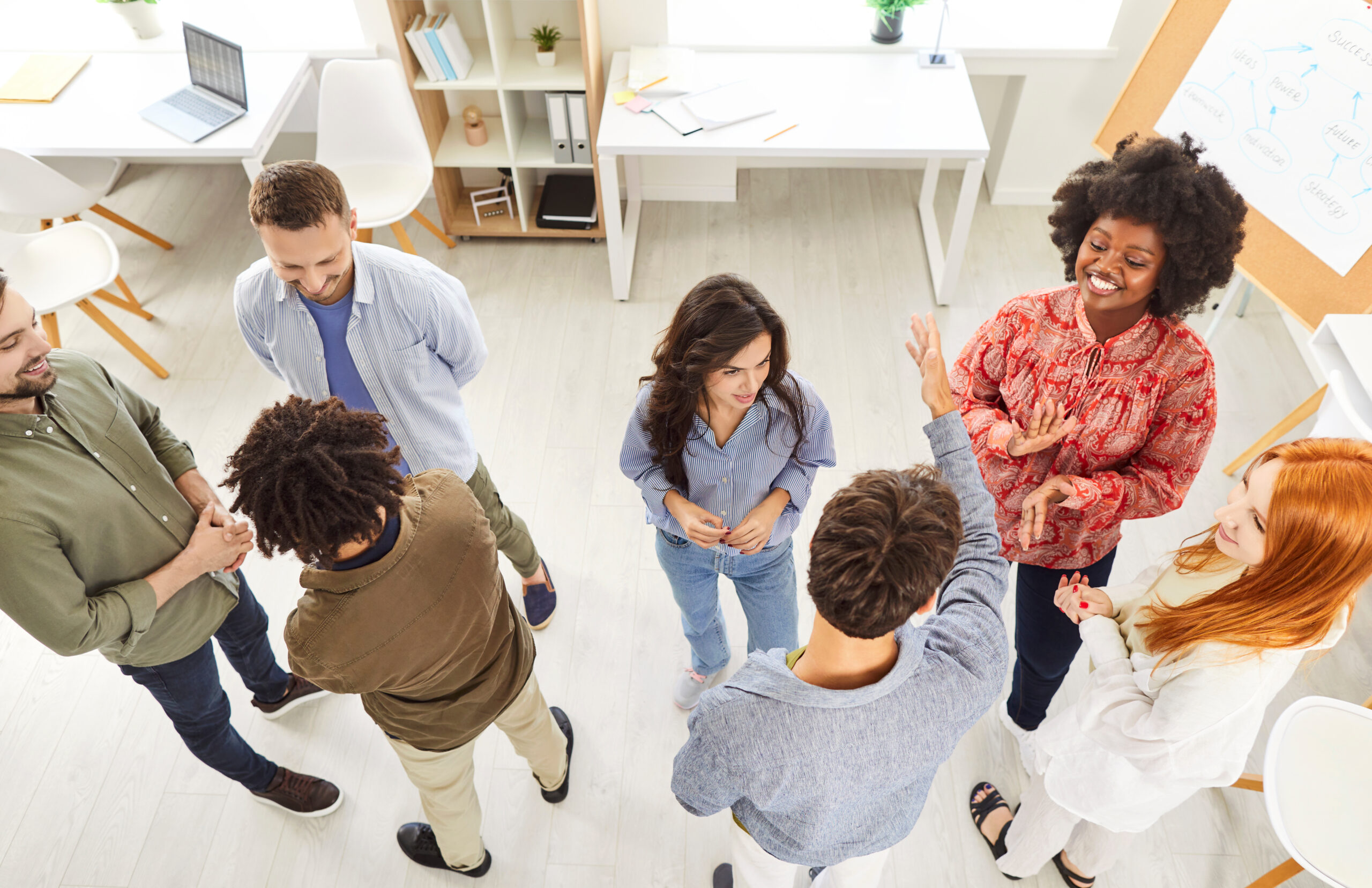 Colleagues Holding Business Meeting Or Training In Office